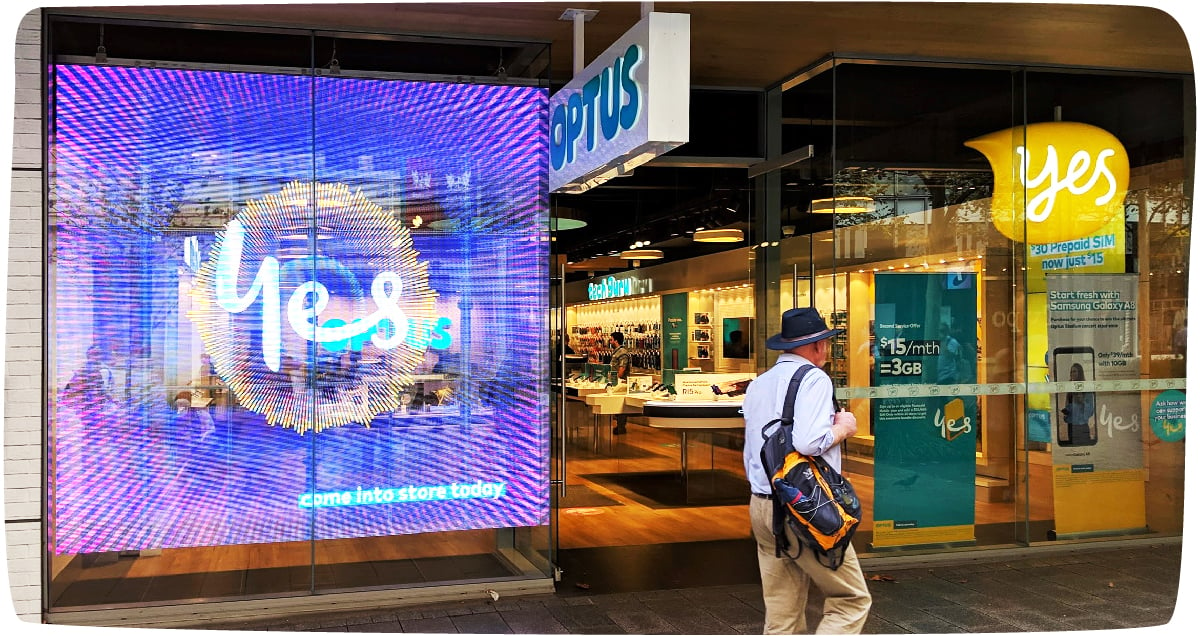 OLED entrance sign at an Optus store
