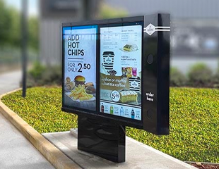 Outdoor drive-thru menu with two screen side by side featuring a cafe menu and specials.  
